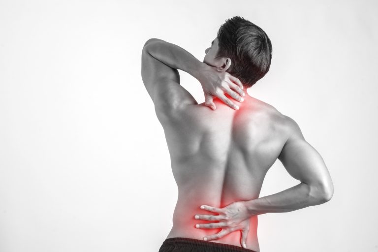Ein stark belasteter Rücken mit sichtbaren Schmerzpunkten – Physiotherapie bei Rückenschmerzen bietet gezielte Übungen und Therapieansätze für Linderung.